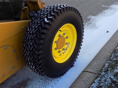 are snowtires for skid steer worth it|skid steer chains vs tires.